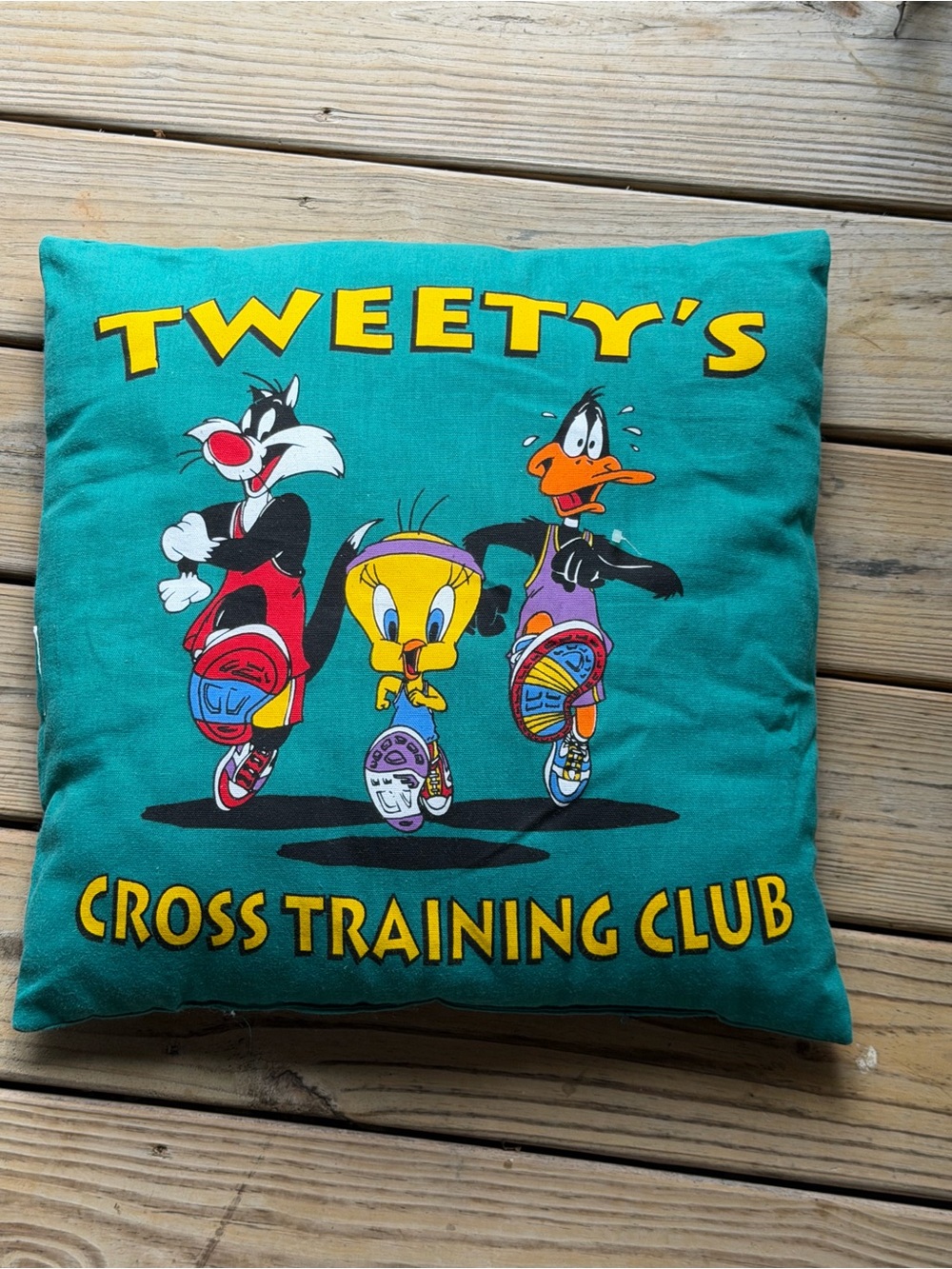 vintage 1994 Looney Tunes Tweety's Cross Training throw pillow by Warner Bros